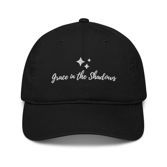 Unisex organic cotton baseball cap black with embroidered affirmation grace in the shadows