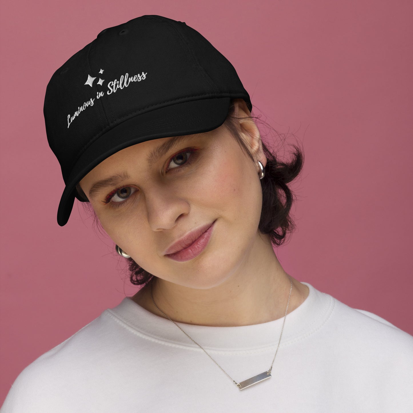 Unisex organic cotton baseball cap  with embroidered affirmation luminous in stillness black 